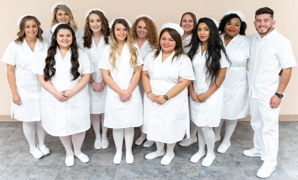 Photo cutline: Hill College Vocational Nursing (VN) students were honored with a pinning ceremony on Thursday, Dec. 6, at the Hill College Vara Martin Daniel Performing Arts Center.
